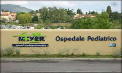 Immagine: foto del muro con sopra logo e scritta ospedale pediatrico meyer